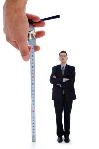 Measuring a men. Metaphoric view of a test before employment